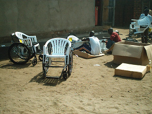 KODO---Assembling-Wheelchairs_web Workers assemble wheelchairs donated by the Malawi Project and Free Wheelchair Mission