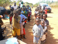 Children line up for school supplies