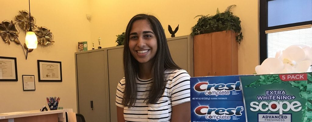 Beautiful Smile with toothpaste in the foreground