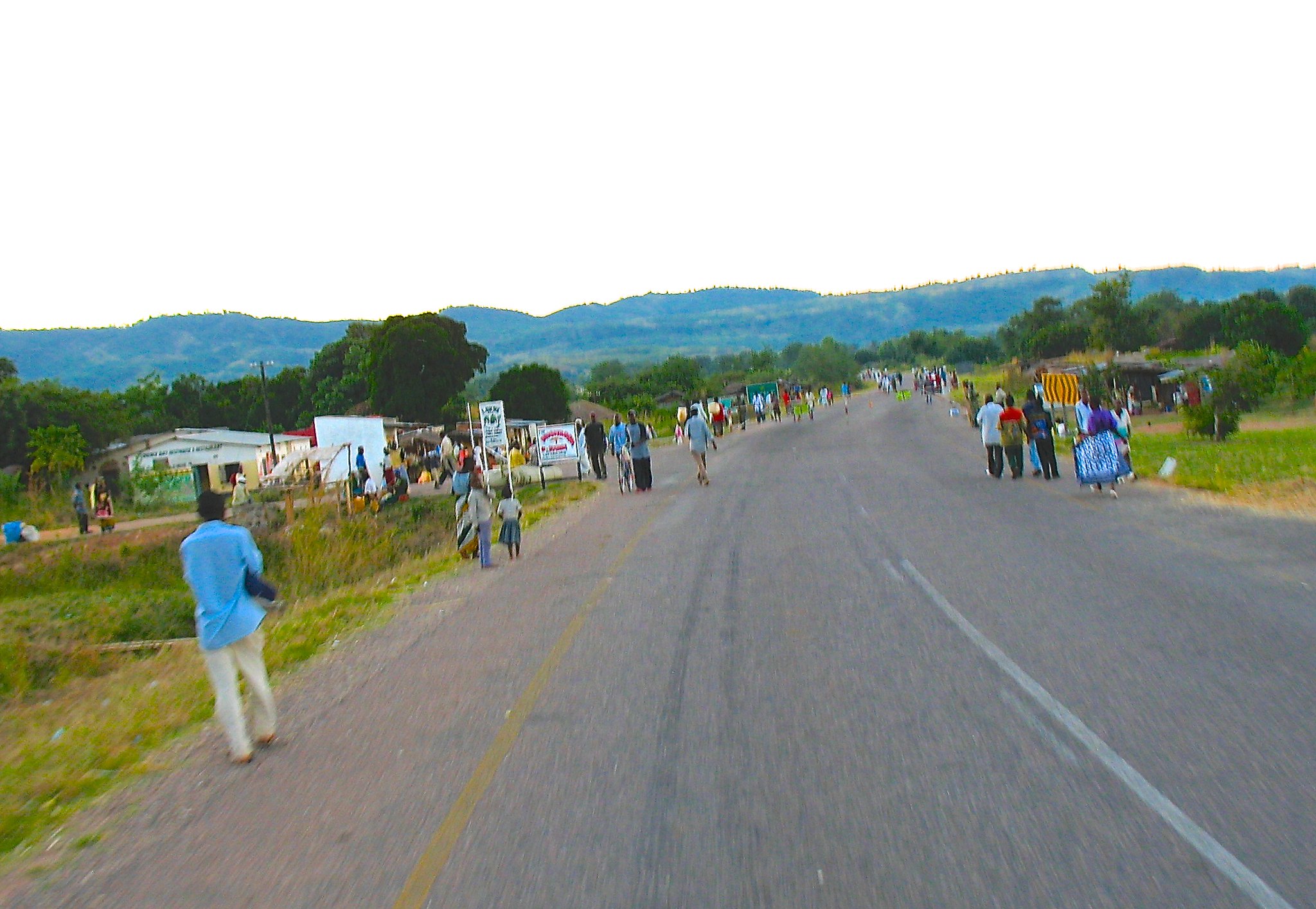People walking on both sides of a road