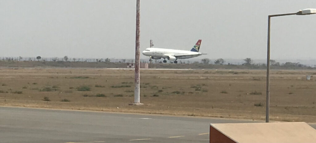 An airplane landing at an airport