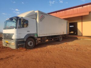 Truck bringing corn from farmers