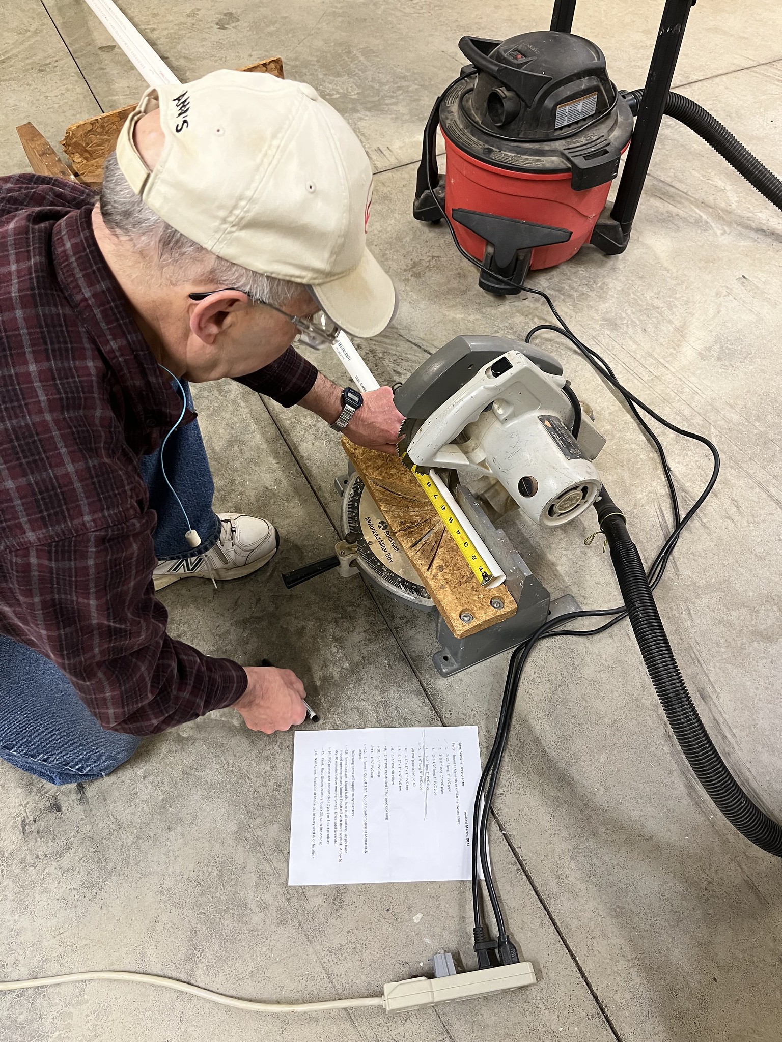 VOLUNTEERS PICK UP TOOLS TO HELP FARMERS